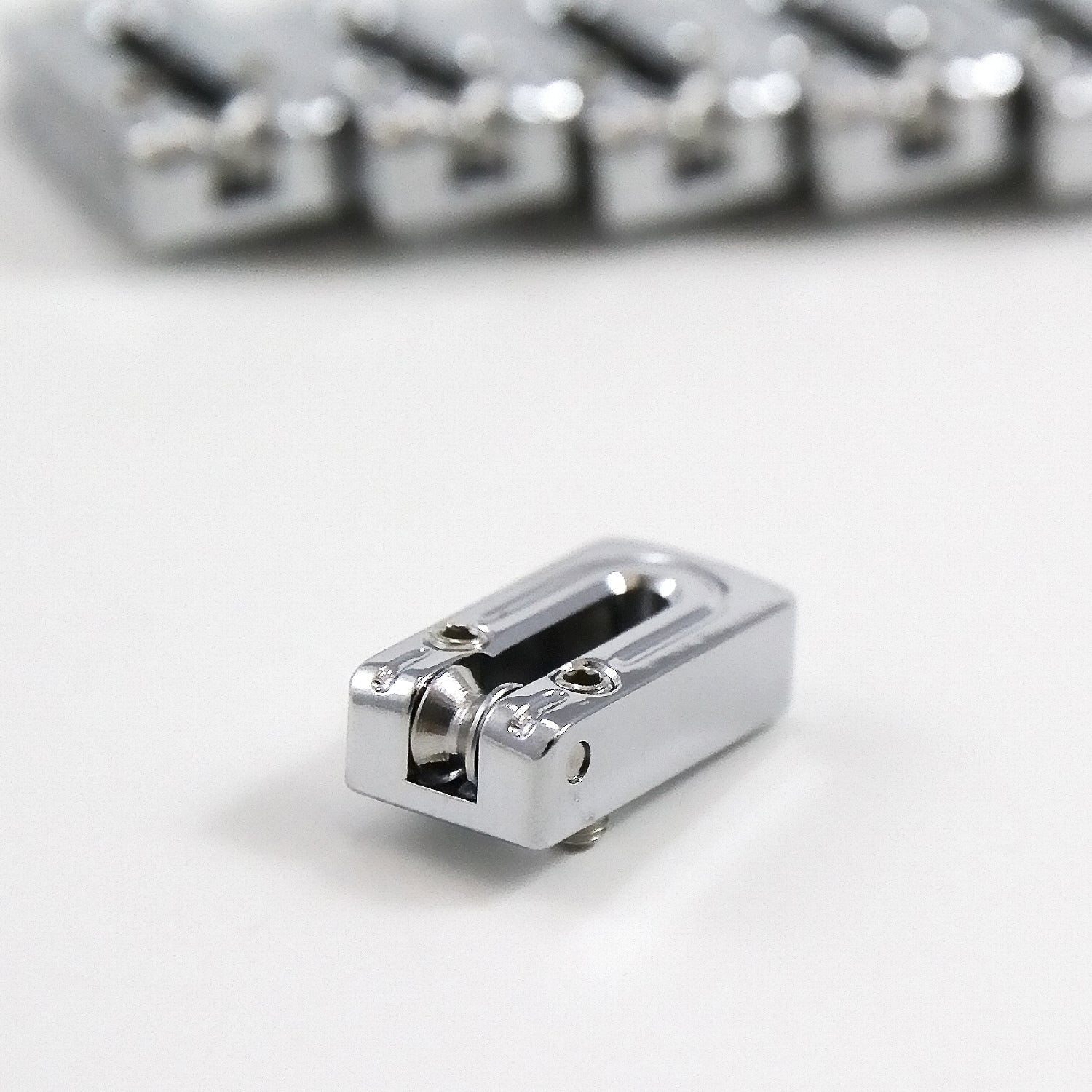 String Surfer Brass Roller Saddles - AxLabs