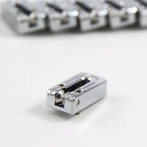 String Surfer Brass Roller Saddles - AxLabs