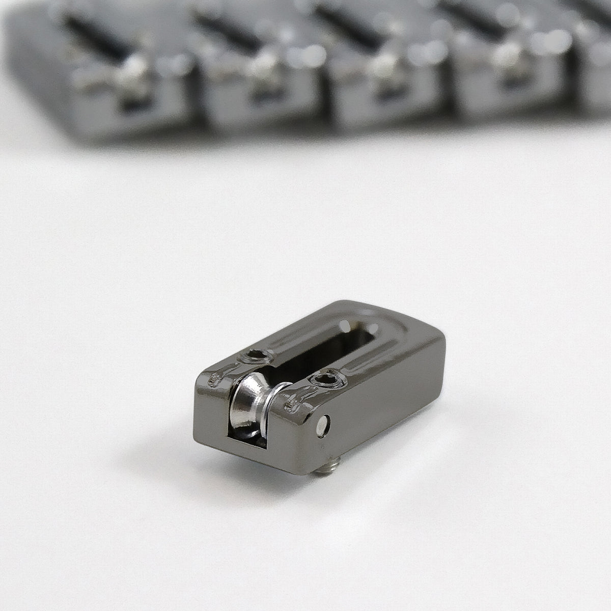 String Surfer Brass Roller Saddles - AxLabs